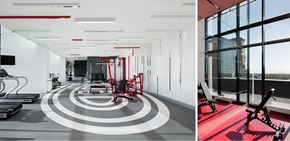 Montréal apartment for rent - A gym with a red and black circular pattern on the floor.