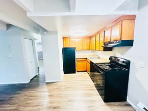 Englewood apartment for rent - A red brick wall with three arched openings.