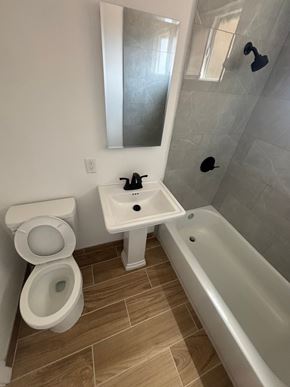 Los Angeles apartment for rent - A white toilet and sink in a bathroom.