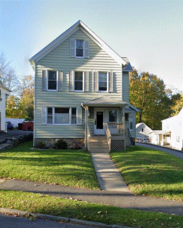 Danbury apartment for rent - A two-story house with a front porch.