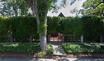 Los Angeles apartment for rent - A house is surrounded by a wall of green ivy.