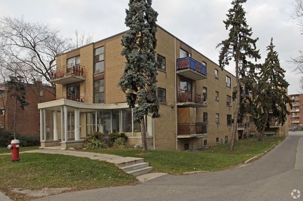 Mississauga apartment for rent - A building with a red fire hydrant in front of it.