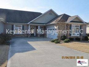 Loudon house for rent - A house with a sign that says Key Rental Management LLC.