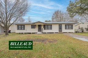 Lafayette house for rent - A mobile home with a sign that says Billeaud Management Co., Inc. in front of it.