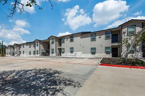 San Antonio apartment for rent - A sunny day at the apartment complex with a clear blue sky.