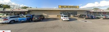 Dickinson apartment for rent - A Dollar General store with cars parked in front.