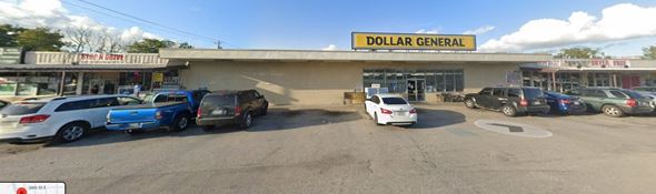 Dickinson apartment for rent - A Dollar General store with cars parked in front.