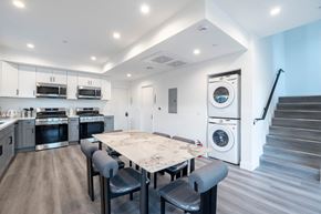 Los Angeles apartment for rent - A modern kitchen with a large island and stainless steel appliances.