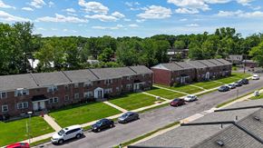 Morrisville apartment for rent - A white bathroom with a toilet, sink, and bathtub.