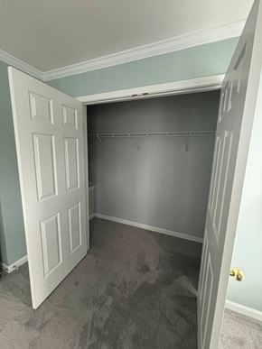 Huntersville house for rent - A white door is open to a room with a grey wall.
