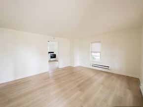 Paulsboro apartment for rent - A room with a carpeted floor and a window.