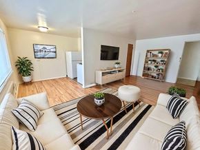 Denver apartment for rent - A laundry room with a washer and dryer.