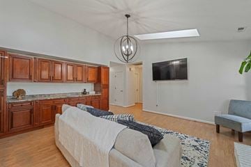 Jacksonville house for rent - A living room with a couch and a television.