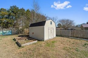 Jacksonville house for rent - A shed sits in a yard with a fence and trees in the background.