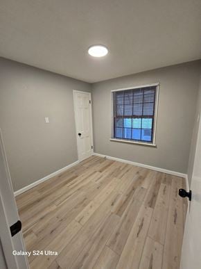 St Louis house for rent - A room with a Galaxy S24 Ultra branded door.