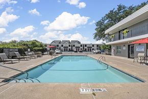 Hewitt apartment for rent - A large swimming pool with the number 3 on the bottom right.