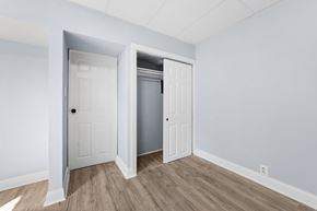 Philadelphia apartment for rent - A room with a white door and a grey door.