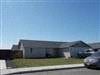 Pasco house for rent - A house with a car parked in front.