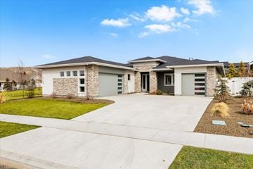 Boise house for rent - A modern house with a stone pillar entrance.