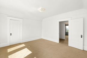 San Francisco house for rent - A room with white doors and a light on the ceiling.
