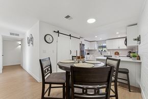 Phoenix apartment for rent - A dining room with a table and chairs.