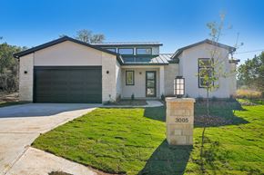 Horseshoe Bay house for rent - A house with the number 3005 on a stone pillar in front of it.