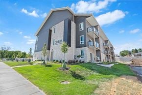 Napanee apartment for rent - A modern apartment building with the name "ONE58" on the front.