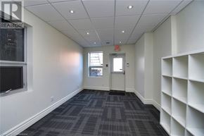 Hamilton apartment for rent - A room with a grey carpet and white walls.