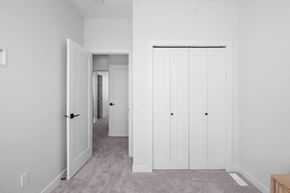 St. Albert apartment for rent - A white door is open to a hallway.