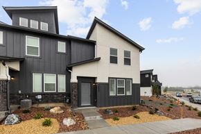 Colorado Springs house for rent - A modern two-story house with a black and white exterior.