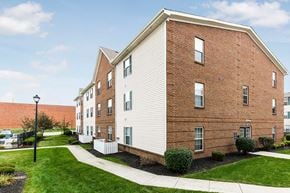 Westerville apartment for rent - A spacious gym with treadmills, elliptical machines, and other exercise equipment.