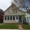 Minneapolis apartment for rent - A small house with a white door and windows.