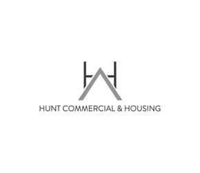 Houston apartment for rent - A logo for Hunt Commercial & Housing is displayed.