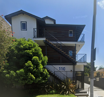Inglewood apartment for rent - A house with the number 110 on the front.