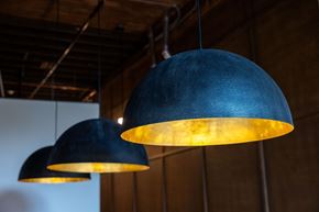 Monroe apartment for rent - Two black lampshades hanging from the ceiling.