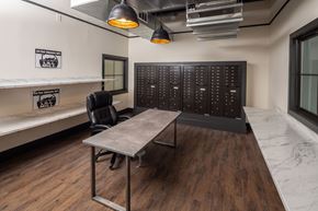 Monroe apartment for rent - A conference room with a long table and a blackboard on the wall.