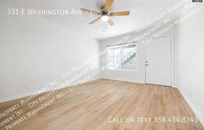 Escondido apartment for rent - A room with a ceiling fan and wooden flooring is on the market at 331 E Washington Ave.