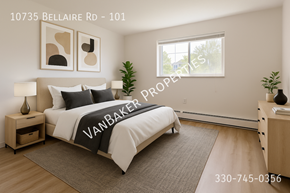 Cleveland apartment for rent - A bedroom with a bed, nightstands, and a plant.