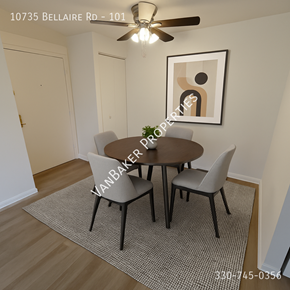 Cleveland apartment for rent - A dining room with a table and chairs and a ceiling fan.