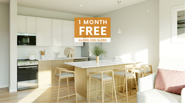 Ottawa apartment for rent - A kitchen with a counter and chairs and a sign that says 1 month free.