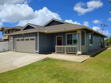 Ewa Beach house for rent - A house with a grey roof and a red door.