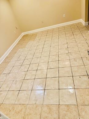 Washington apartment for rent - A room with tan tile flooring and white walls.