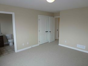 Kingston house for rent - A room with a toilet and a door.