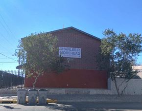 El Paso apartment for rent - A red building with a sign that says Charles R Morhead.