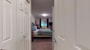 Fort Mcmurray house for rent - A bedroom with a bed and a window.