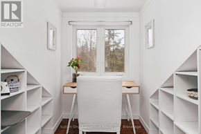 Lake Of Bays (Sinclair) house for rent - A room with a desk and a window.