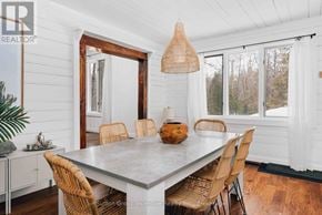Lake Of Bays (Sinclair) house for rent - A bathroom with a white tub, sink, and toiletries.