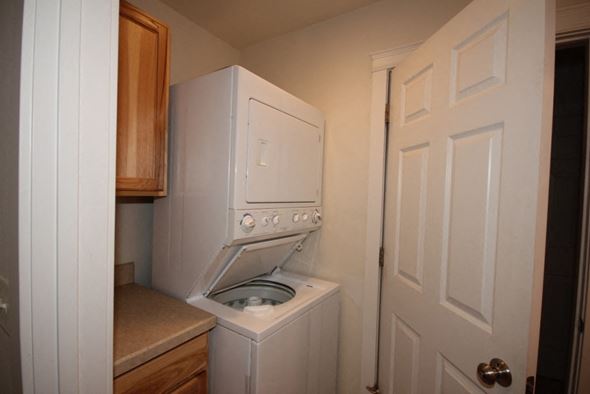 Whitefish apartment for rent - A white oven and stove in a kitchen.