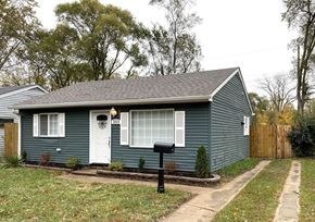 Gary house for rent - A small house with a white door and a mailbox in front.