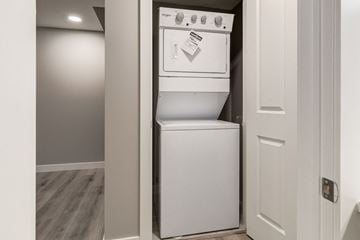 Spruce Grove apartment for rent - A white dishwasher is installed in a kitchen.